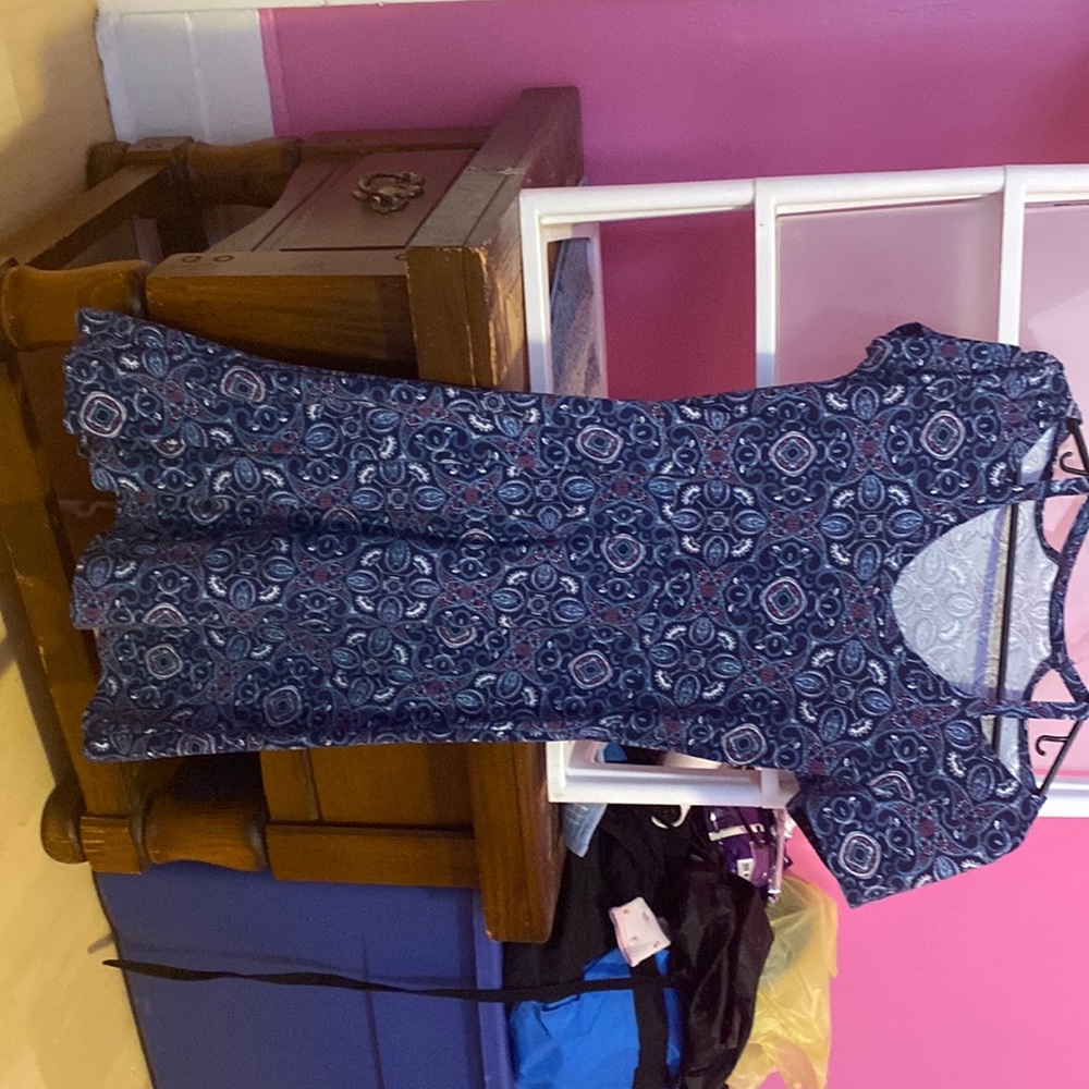 Small dress great condition never worn blue, purple designs great family events